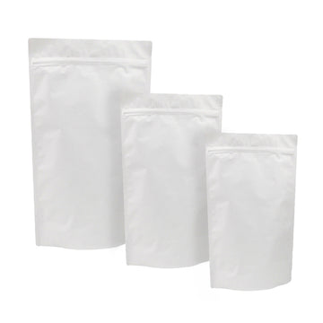 Tre buste, di diverse misure, bianche con zip